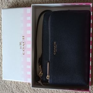 Brand new rich navy blue leather Coach wristlet. Gift box  included.